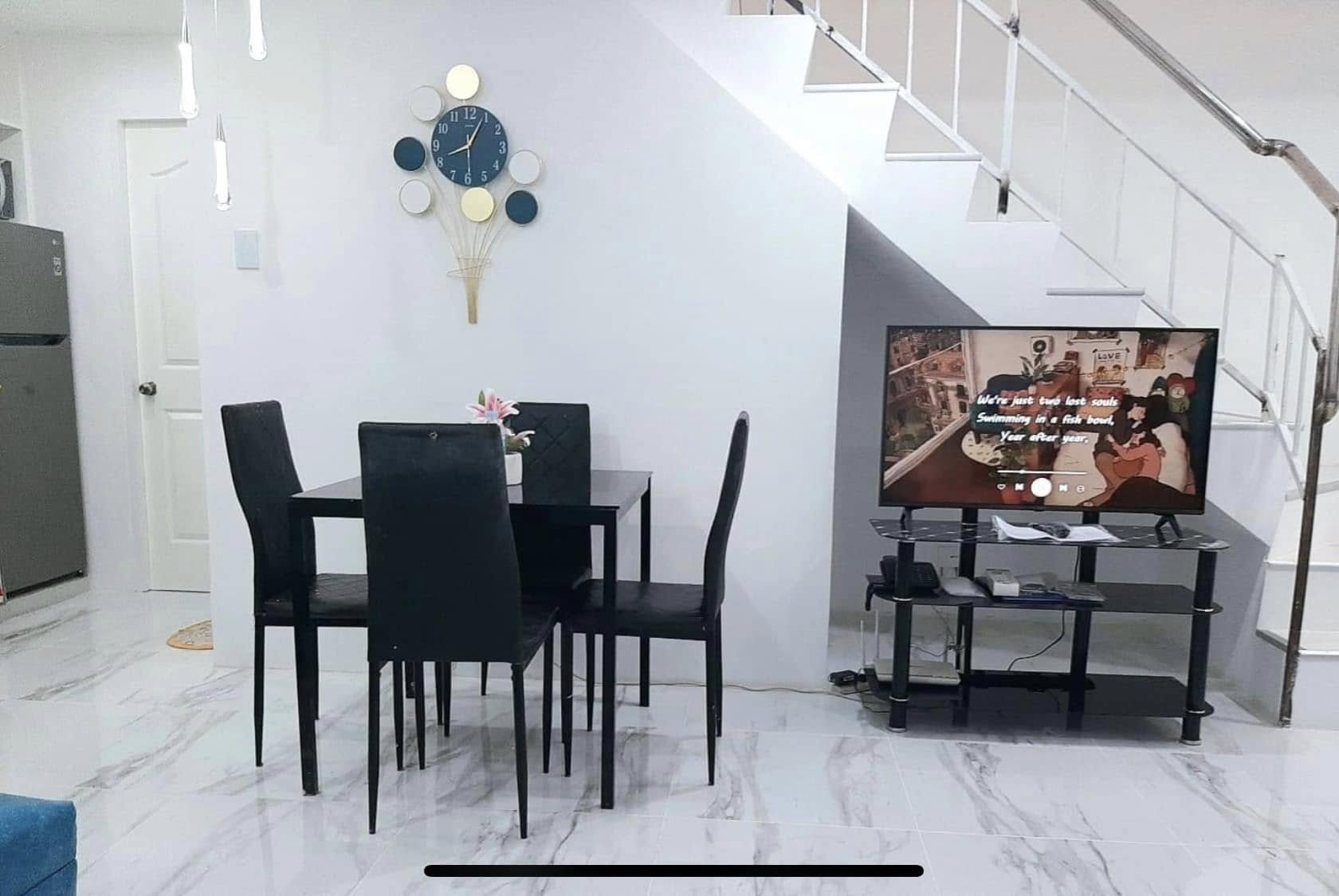 Dining table for six and TV