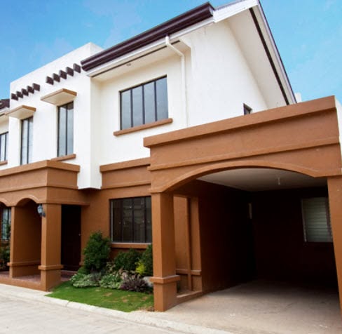Front of the house with carport and garden